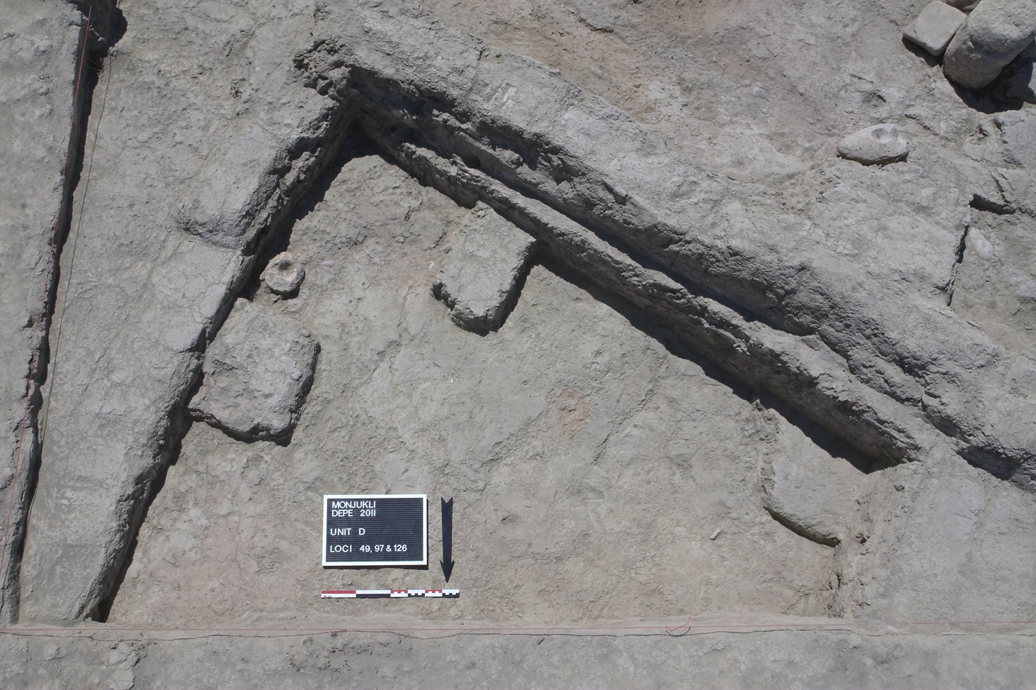 The southeastern corner of House 2, with three small buttresses or platforms along the walls.