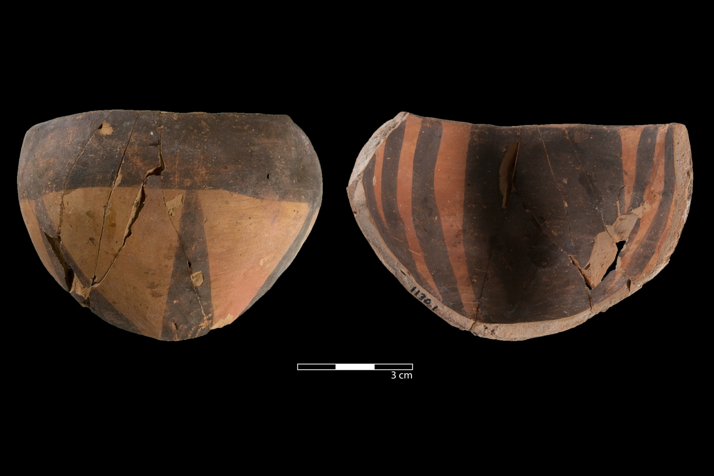 Small Meana Black on Red incurved rim bowl with painted rays extending upward from the base and a horizontal band along the rim, forming the typical Meana Horizon star motif when viewed from below.